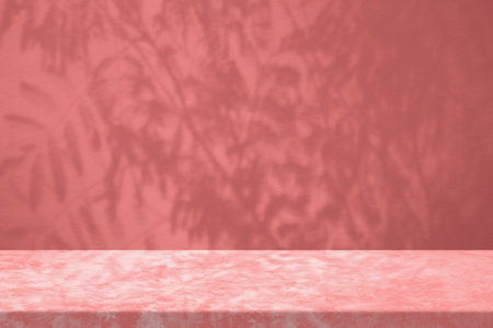 Marble Table with Natural Shadow on Concrete Wall Texture Background in Pink Tone, Suitable for Cosmetic Product Presentation Backdrop, Display, and Mock up.の写真素材