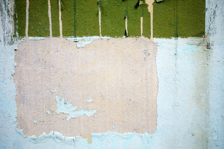 Peeling Poster left Glue Adhesive Stain on White Concrete wall.の写真素材