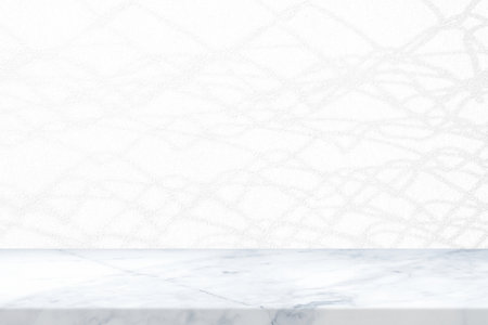 Marble Table with Broken Metal Fence Shadow on Concrete Wall Texture Background, Suitable for Product Presentation Backdrop, Display, and Mock up.の写真素材