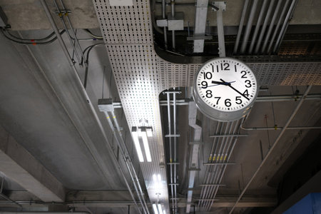 Analog Clock Hanging on Ceiling.の写真素材