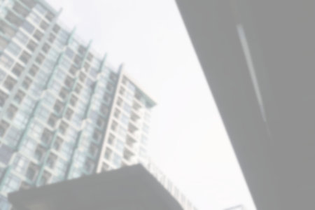 White Blurred New Condominium Building Background with Space for Text, Suitable for Business Presentation.の写真素材
