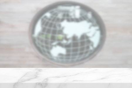 White Marble Table with Blurred Glass Window Background.の写真素材