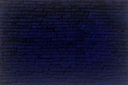 Blue Old Brick Wall with White Vignette Background, Suitable for Backdrop and Presentation.の写真素材