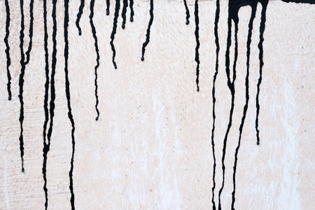 Stained Black Painting on Grunge Concrete Wall Texture Background.の写真素材