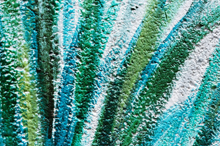 Unfinished Colorful Painting on Concrete Wall.の写真素材