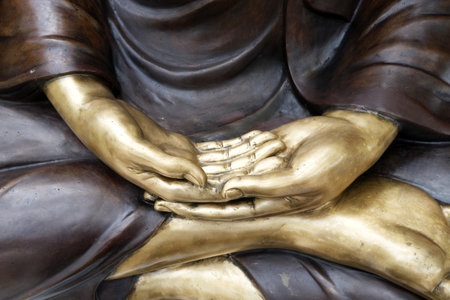 Closed up Hand of Buddha Image.の写真素材