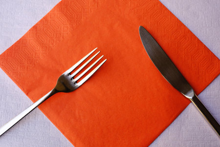 Knife and Fork on Red Napkin.の写真素材