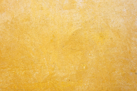 Rustic Gold Concrete Wall Texture for Background.の写真素材