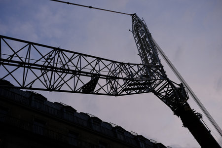 Silhouette Huge Crawler Crane with Sunset Background.の写真素材
