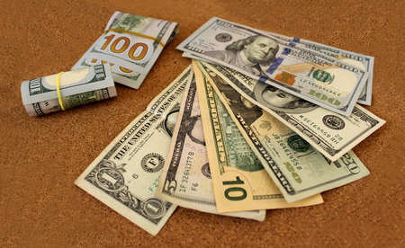 money with wooden backgroundの写真素材