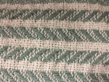 Knitted woolen fabric as a background. Close-up.の写真素材