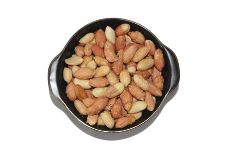 Roasted peanuts in a pan, top view