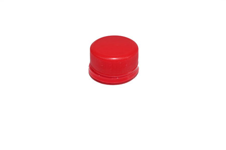 Red plastic bottle cap isolated on white background, clipping path included.の写真素材
