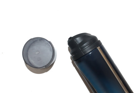 Thermo flask isolated on a white background. Close-up.