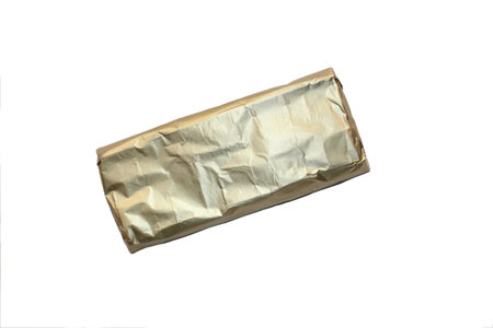 Crumpled brown paper isolated on white background.