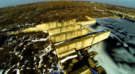 Aerial photo with a frozen lake and a lock