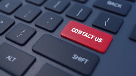 The text contact us is on keyboardの写真素材