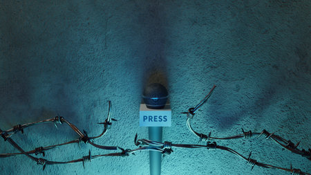 A reporter's microphone at a press conference, through barbed wire. 3d renderingの写真素材