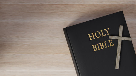 Top view of a cross and Bible together on a desk. 3d renderingの写真素材
