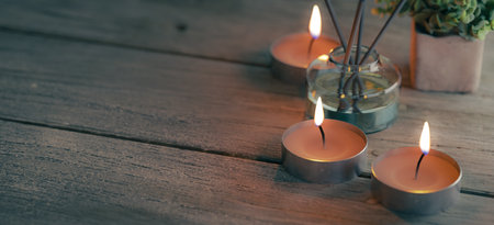 Copy space background with candle on wooden table, 3d renderingの写真素材