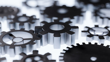 Concept image of gears going into a machine.3d renderingの写真素材