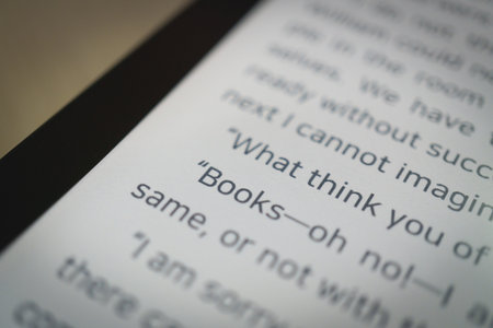 Close up e-book reader screen with literature text copy spaceの写真素材