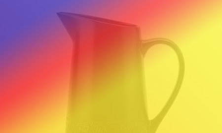 A close up shot of a glass jug with a rainbow coloured backgroundの素材