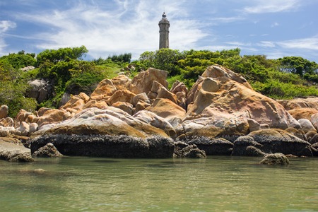 Lighthouse Ke Ga, rocks in the seaの写真素材