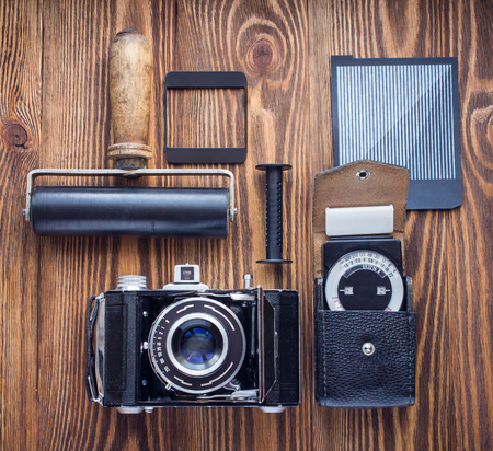 vintage camera,exposure meter and another trappings of film photography. photographer's deskの写真素材