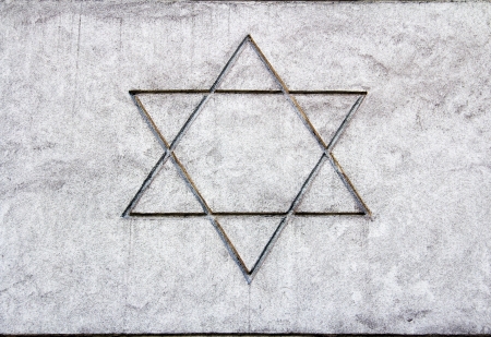 Star of David sketch on a cement wall の写真素材