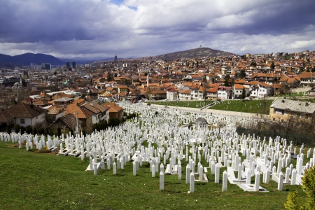 Muslim graveyard, matryrdom, under cloudy sky in Sarajevo , Bosnia and herzegovina  The Islamic religion is one of the three major religion in Bosnia  の写真素材