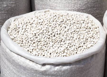 Close up of white beans sackの写真素材