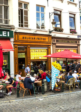 Brussels, BELGIUM - July 7, 2019: classic Belgian frites with choice of sauces, plus burgers and snacks in Brussels, Belgiumのeditorial素材