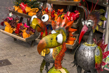 Wurzburg, Germany : Various interesting colored figures of decorative birds on the street display of a shopのeditorial素材