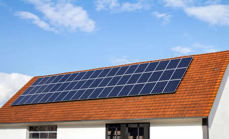 Roof solar panels technology - photovoltaic electricity cells installationのeditorial素材