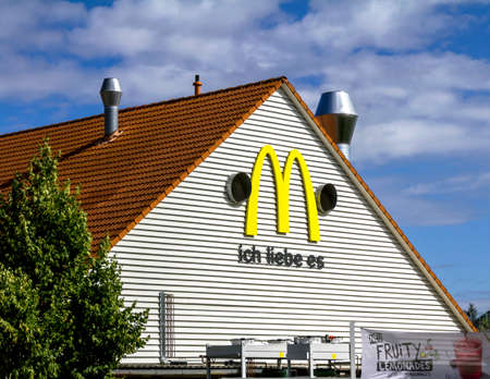 Furth, Germany : McDonald's fast food restaurant with drive through and 24 hours service.のeditorial素材