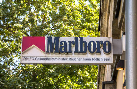 Marlboro cigarette logo outside a shop. Marlboro is the best-selling brand of cigarettes in the world. It is made by Philip Morrisのeditorial素材