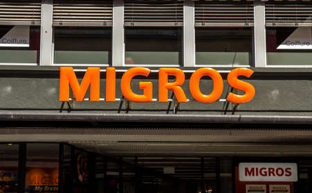 Basel, SWITZERLAND - July 1, 2019: entrance to Migros supermarket in Zurich International Airport. Migros is Switzerland's largest retail company.のeditorial素材