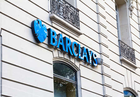 PARIS, FRANCE :   Sign and logo above the entrance to a branch of Barclays Bank in Paris Franceのeditorial素材