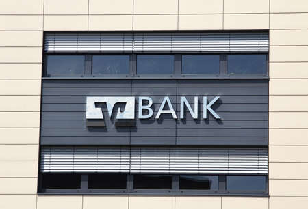 Erlenbach am Main, GERMANY: Volksbank branch. Sign with the logo of the german credit union Volksbank - Raiffeisenbankのeditorial素材