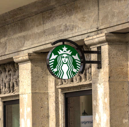 Augsburg, Germany : Sign Starbucks Coffee. Starbucks Coffee is the largest coffeehouse company in the worldのeditorial素材