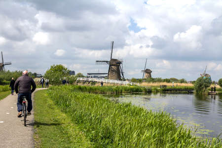 Netherlands rural lanscape with windmills at famous tourist site Kinderdijk, Rotterdam, in Holland. Old Dutch village Kinderdijk, UNESCO world heritage site.のeditorial素材