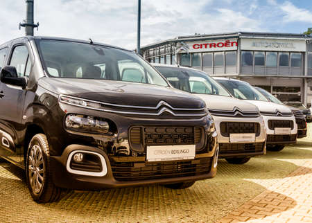 Nurnberg, Germany: Citroen emblem at one of Citroen's auto dealerships, Citroen is a french car maker, part of PSA Peugeot Citroen, view of parked luxury cars in row.のeditorial素材