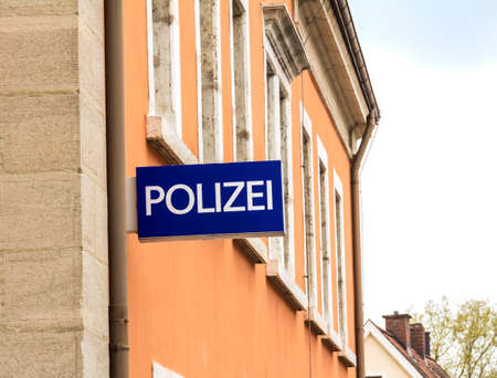 Hilpoltstein/ GERMANY - MAY 1, 2019: Polizei sign on a german police department in Hilpoltstein. The german word Polizei means policeのeditorial素材