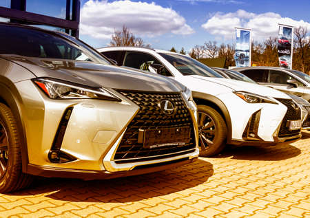 Nurnberg, Germany - LEXUS cars parked in front of car dealer. view of parked luxury cars in row.