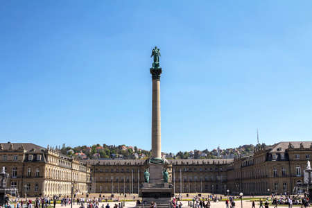 STUTTGART - Apr 20, 2019: The New Palace - Neues Schloss is a beautiful building located in Schlossplatz, the central square. This is a perfect place for locals and tourists relaxation.のeditorial素材