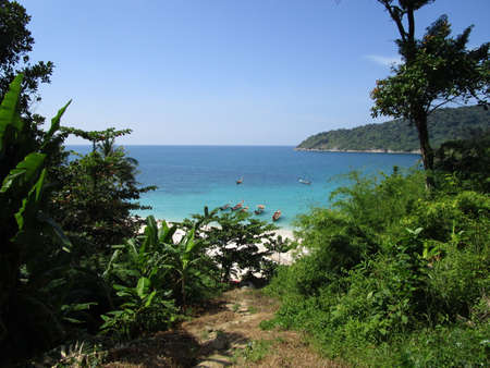 View on a beautiful Thai beach from the distance in Patong, Phuketの写真素材