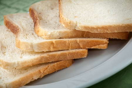 Some slices of toast bread on a white plate