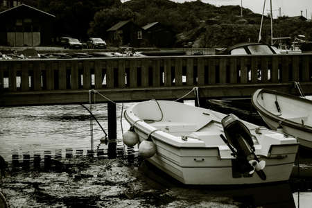 A monochromatic picture of a small boat at the west coast of Sweden. Bleket, Tjorn.の写真素材