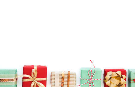Collection of colorful Christmas presents isolated on white. Flat lay. View from above. Copy space.
